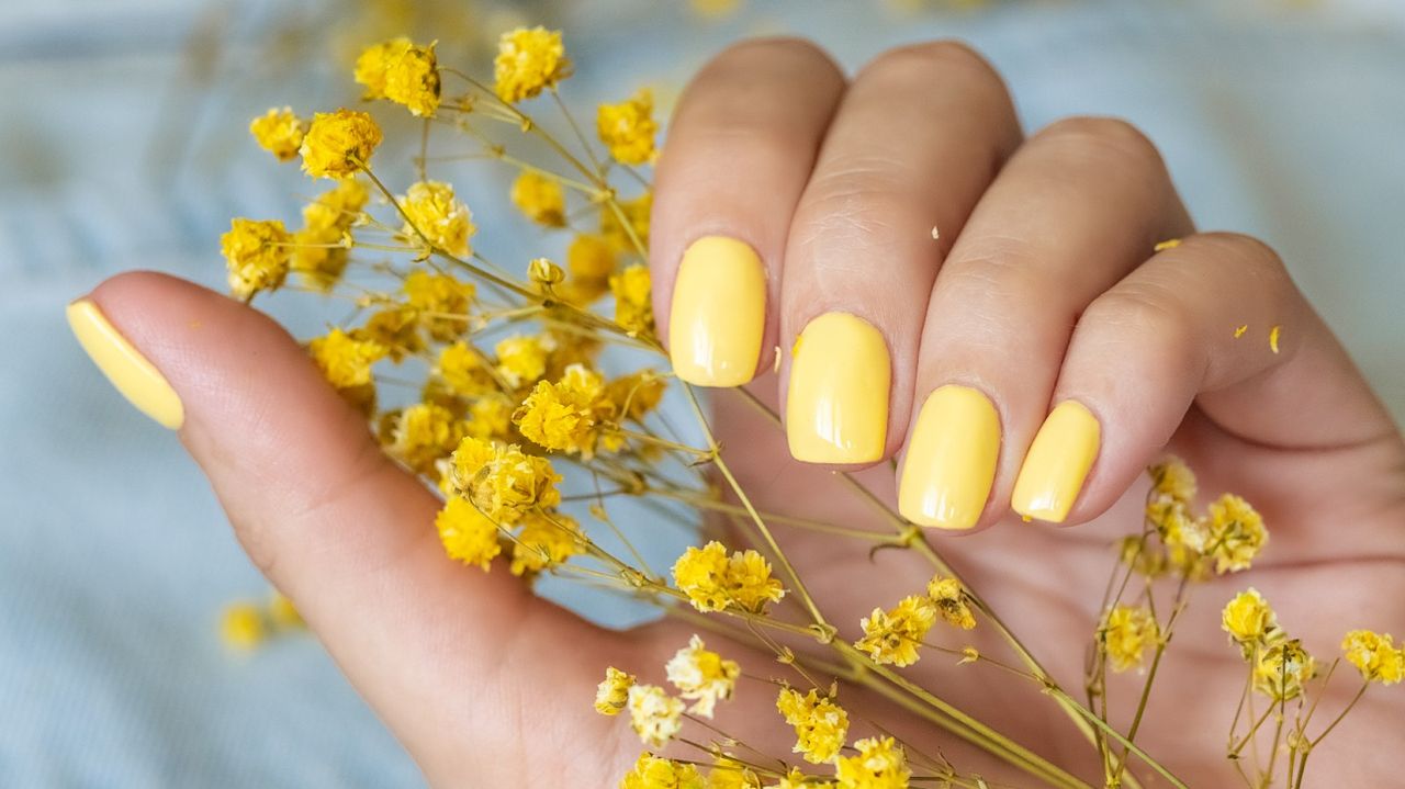 Beautiful woman&#039;s nails with beautiful manicure. studio shot