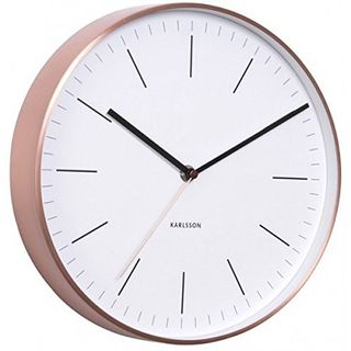 This beautiful copper-rimmed clock would make a great addition to any home or studio