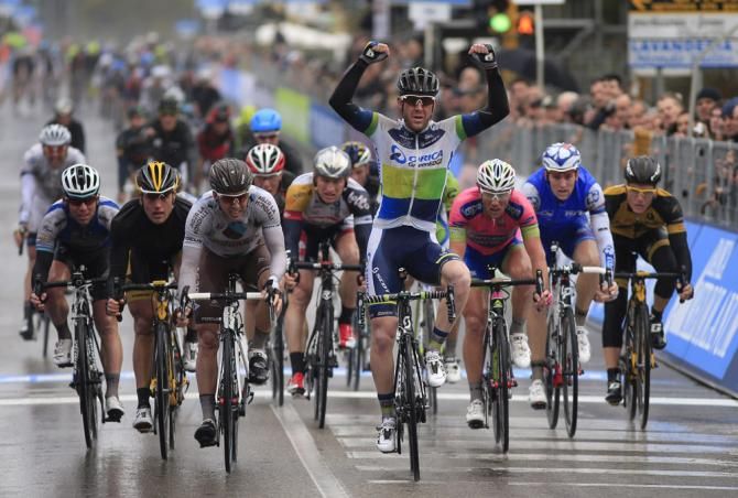 Matt Goss (Orica-GreenEdge) celebrates victory in a rainy stage 2 at Tirreno-Adriatico.