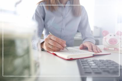 Woman compiling a household budet