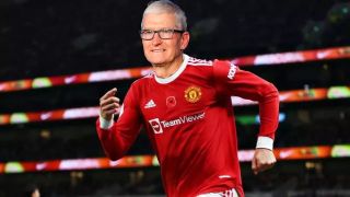 Tim Cook in a Manchester United shirt