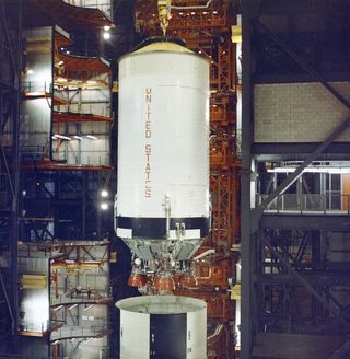 Lowering the Saturn V S-II (second) stage of the Apollo 6 mission onto the S-IC (first) stage during final assembly.