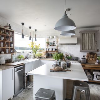 White kitchen in new build house near Sound of Mull