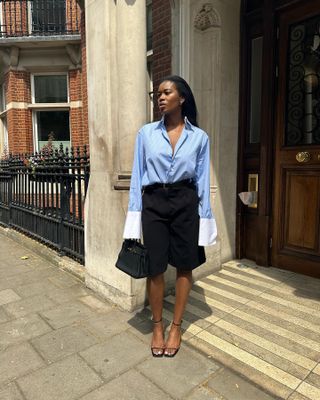 Marilyn Nwawulor-Kazemaks 33 Incredibly Chic Tops That Will Get You Compliments Blue Button Down Shirt Oversize Cuffs Contrast Cuff Top