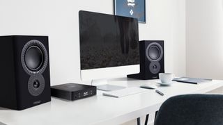 Mission LX Connect all-in-one hi-fi system positioned on a modern white desk