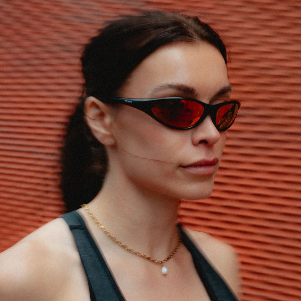 Always In Motion model wearing a pair of the best running sunglasses