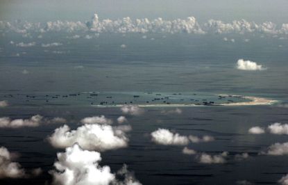 An aerial photo of one of the disputed islands in the South China Sea.