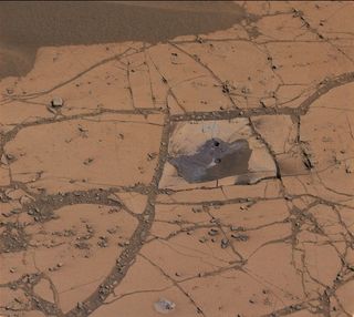 Curiosity Drills Holes on Mars