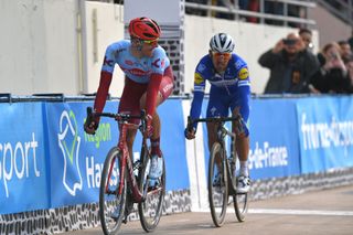Nils Politt leads Philippe Gilbert in the Roubaix Velodrome