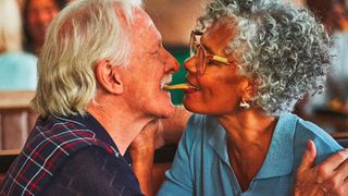 Image of an elderly couple kissing from a Burger King ad campaign
