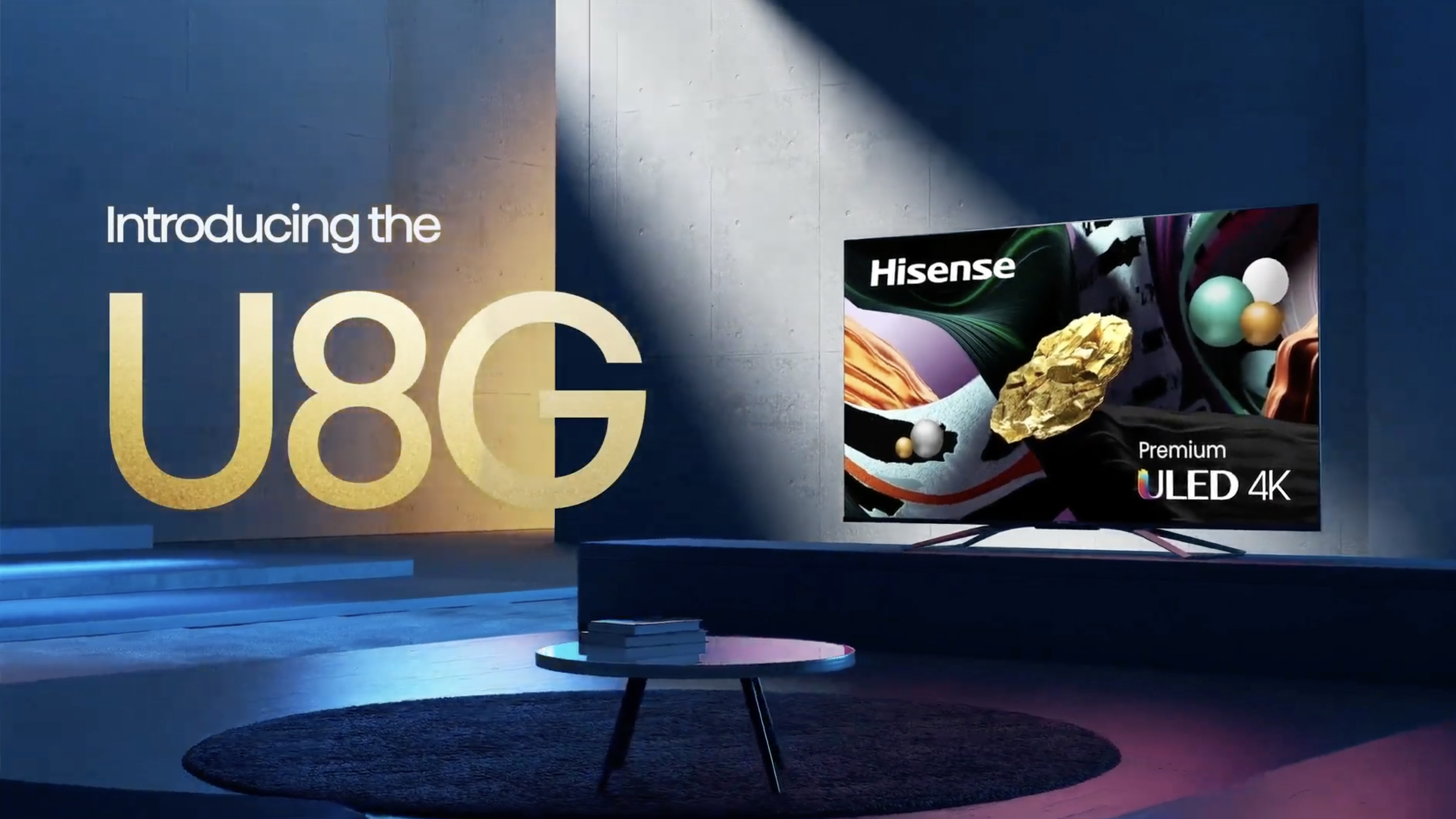 The Hisense U8G ULED TV hanging in a dark grey living room