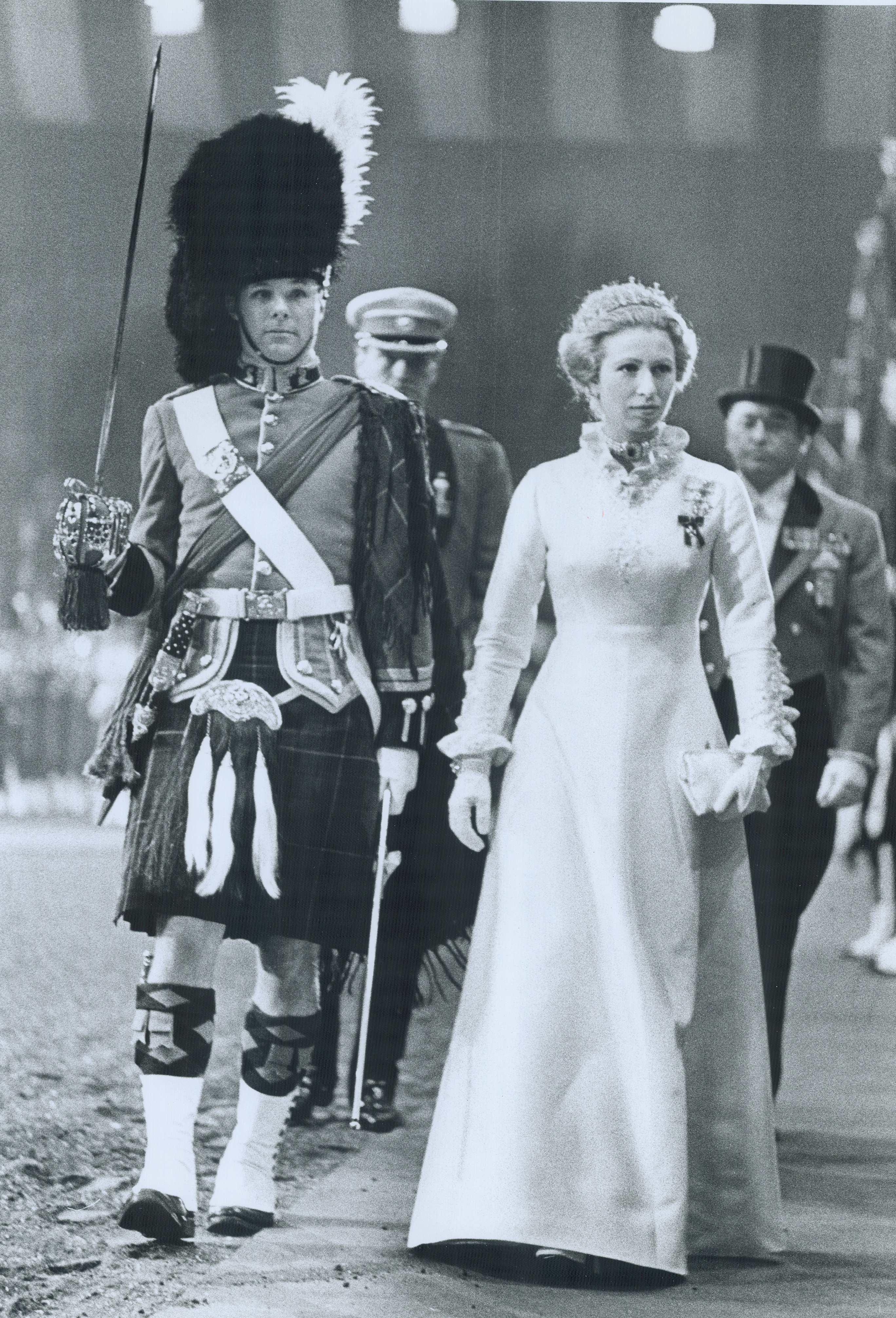 Princess Anne wears a long dress and tiara in 1974