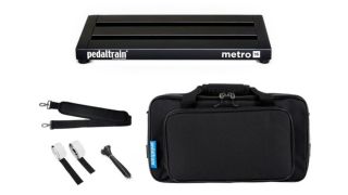 A Pedaltrain Metro 16 pedalboard with carry case and accessories