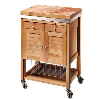 A wooden butchers block unit on castors with various drawers and a pair of cupboard doors