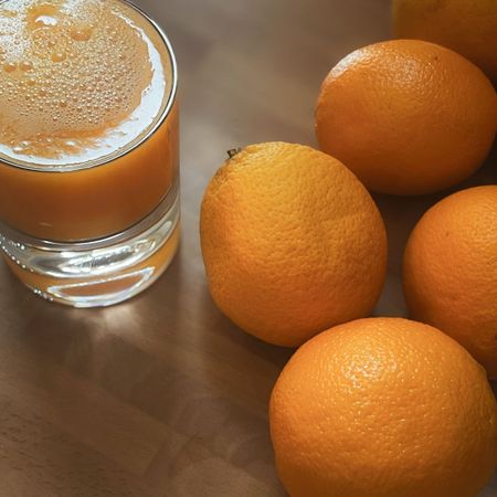 Habit stacking your nutrition: Orange juice, eggs and sourdough, and a yoghurt bowl with raspberries
