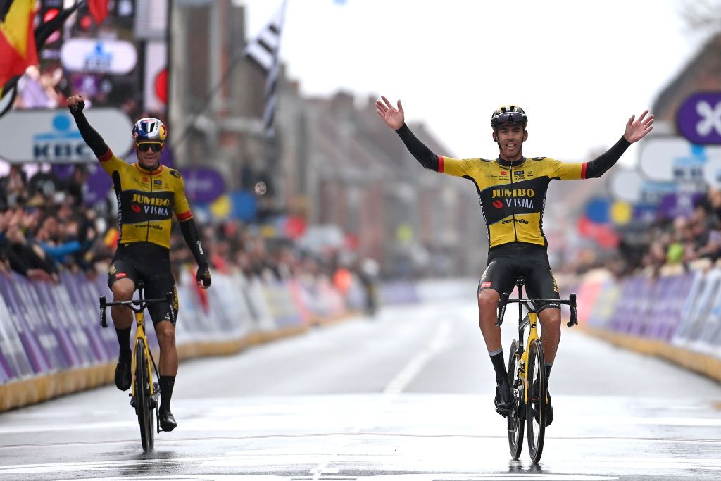 WEVELGEM BELGIUM MARCH 26 LR Wout Van Aert of Belgium and race winner Christophe Laporte of France and Team JumboVisma celebrate at finish line during the 85th GentWevelgem in Flanders Fields 2023 Mens Elite a 2609km one day race from Ypres to Wevelgem UCIWT on March 26 2023 in Wevelgem Belgium Photo by Tim de WaeleGetty Images