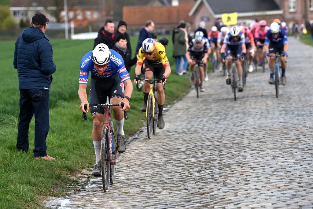 HARELBEKE BELGIUM MARCH 24 Mathieu Van Der Poel of The Netherlands and Team AlpecinDeceuninck leads the breakaway during the 66th E3 Saxo Bank Classic Harelbeke 2023 a 2041km one day race from Harelbeke to Harelbeke on UCIWT March 24 2023 in Harelbeke Belgium Photo by Tim de WaeleGetty Images