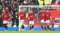 Manchester United's Diogo Dalot, Kobbie Mainoo, Scott McTominay, Raphael Varane, Christian Eriksen, Harry Maguire of Manchester United walking.