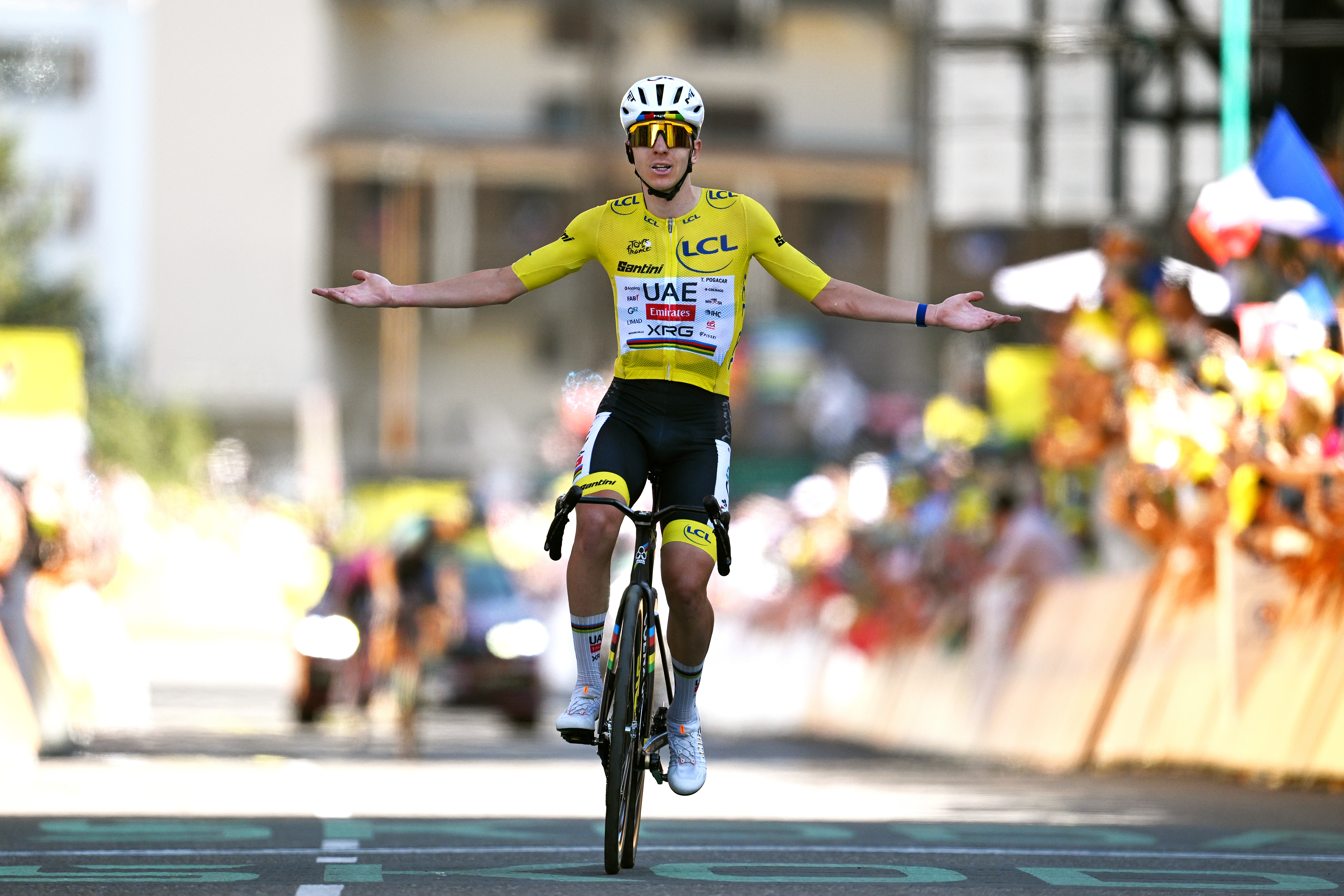 Tadej Pogacar of Slovenia and UAE Team Emirates - XRG - Yellow Leader Jersey celebrates at finish line as stage winner during the 113th Tour de France 2026 on Alpe d'Huez