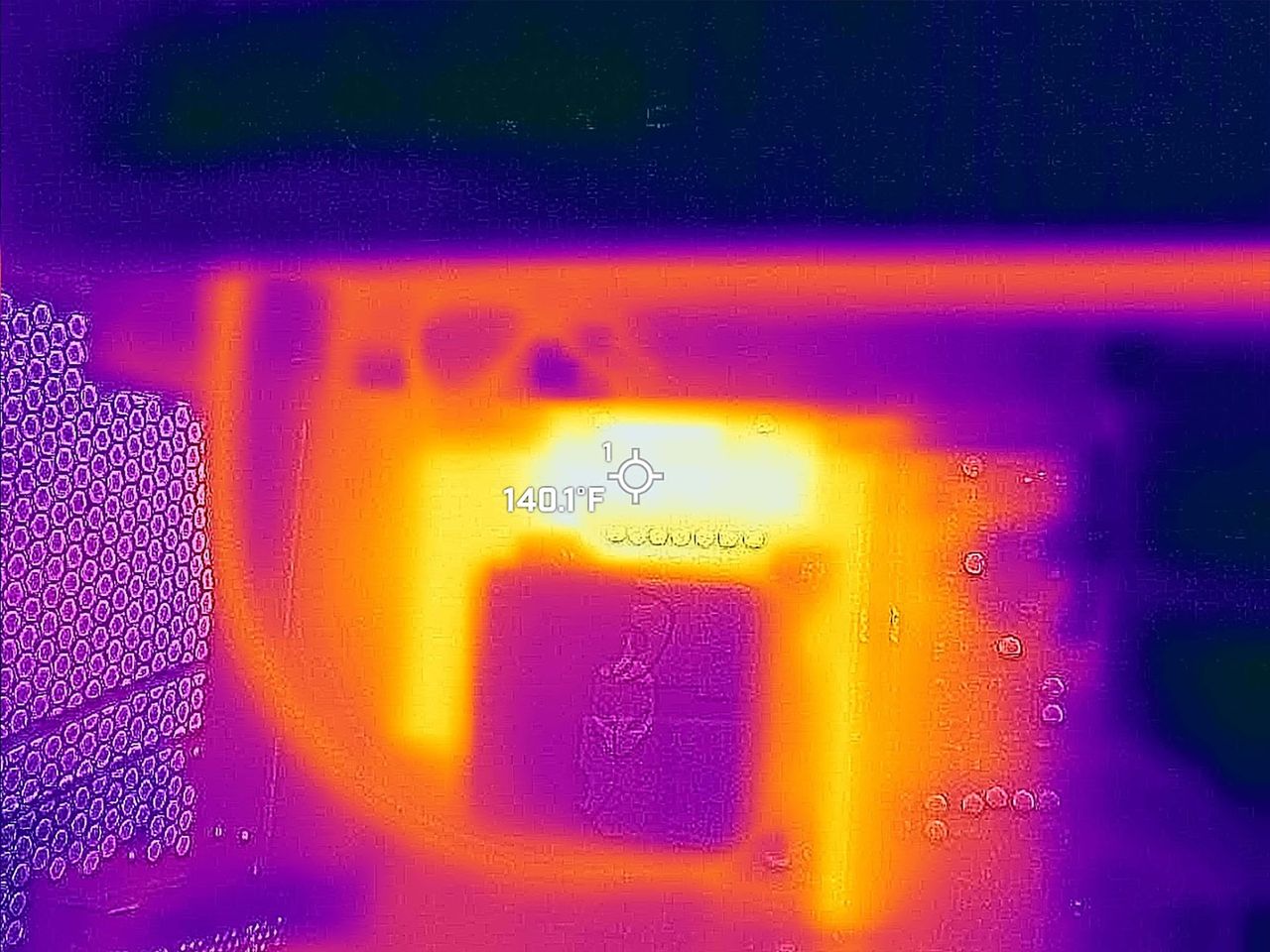 Photo taken with a thermal camera that shows the Area-51 Desktop's back CPU peaking at 140 degrees F.