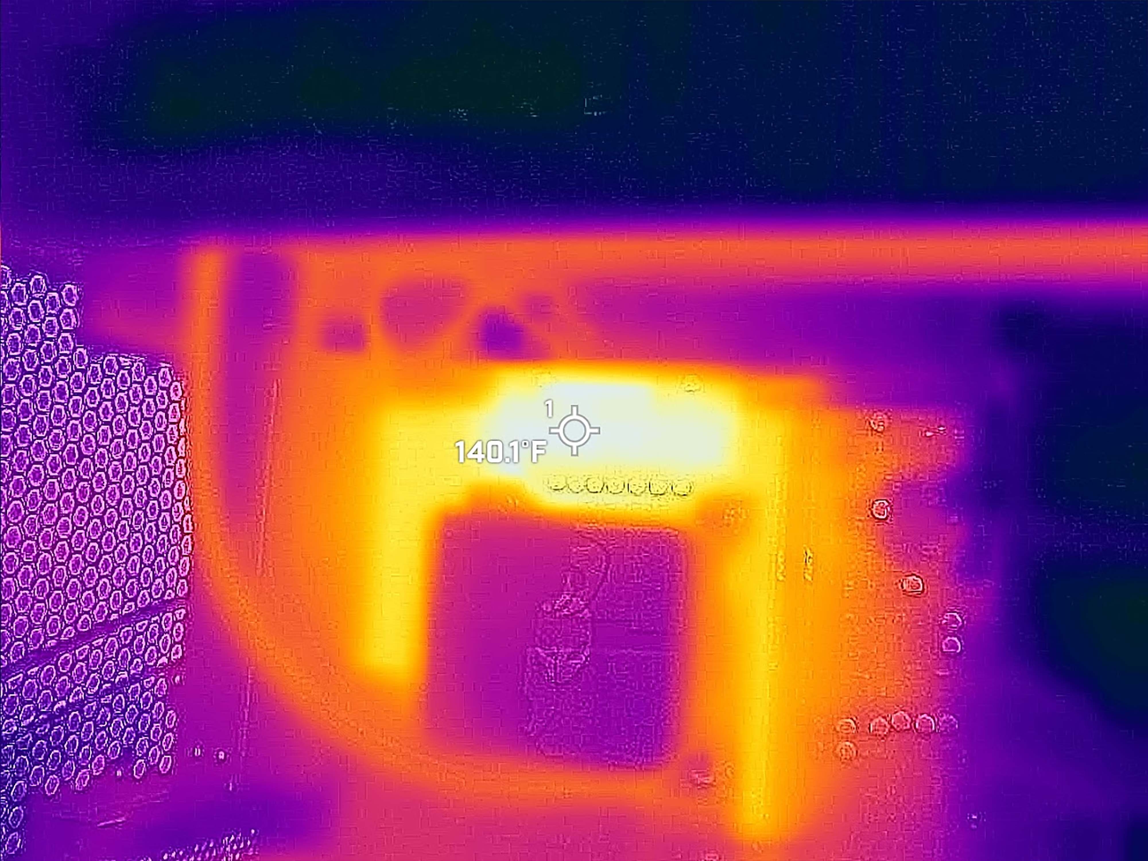 Photo taken with a thermal camera that shows the Area-51 Desktop's back CPU peaking at 140 degrees F.