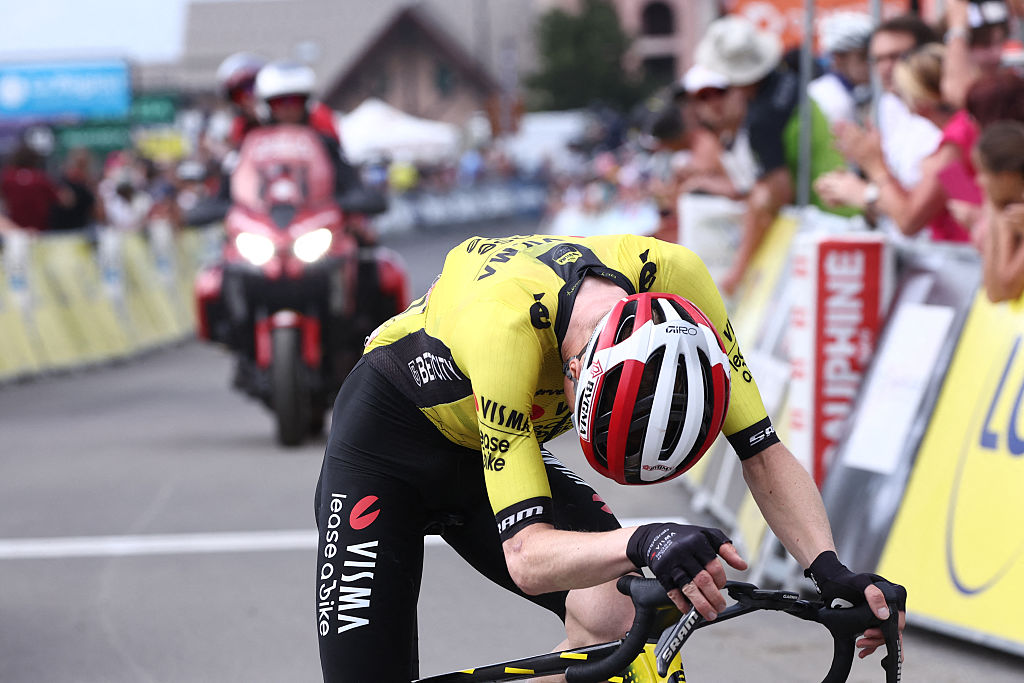 Team Visma - Lease a Bike's Danish rider Jonas Vingegaard reacts as he crosses the finish line the 7th stage of the 77th edition of the Criterium du Dauphine cycling race, 131,6 km between Grand-Aigueblanche and Valmeinier, on June 14, 2025. (Photo by Anne-Christine POUJOULAT / AFP) (Photo by ANNE-CHRISTINE POUJOULAT/AFP via Getty Images)