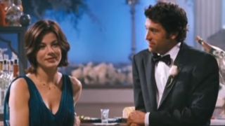 Patrick Dempsey's character in Made of Honor looks at Michelle Monaghan as she looks at someone else.