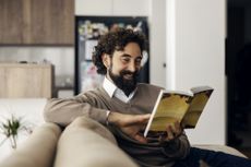 Man reading money books for 2026