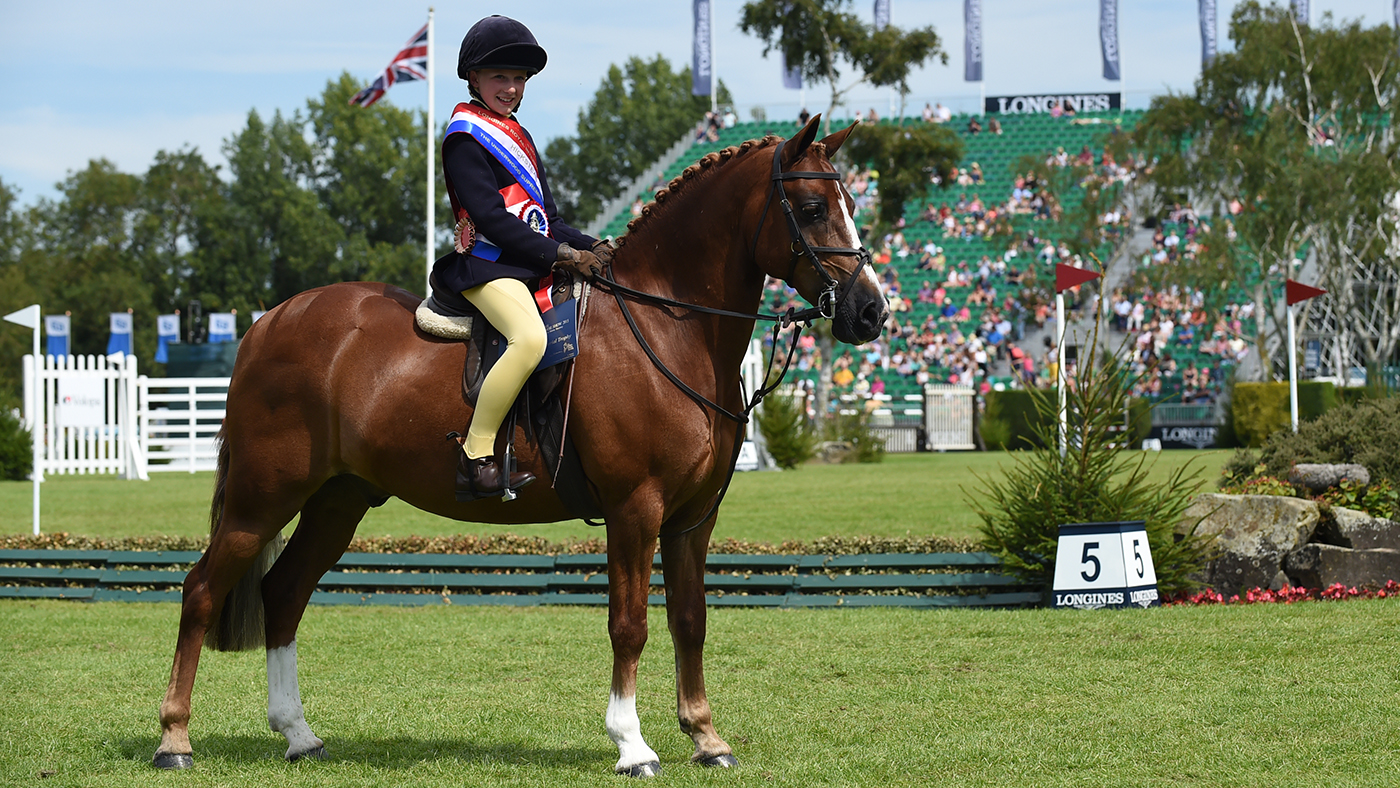 Beat The Boss and Polly Eddis are supreme champions at the Royal International having earlier stood working hunter pony champions.