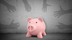 Shadowy hands on a gray background reach for a piggy bank in the middle.