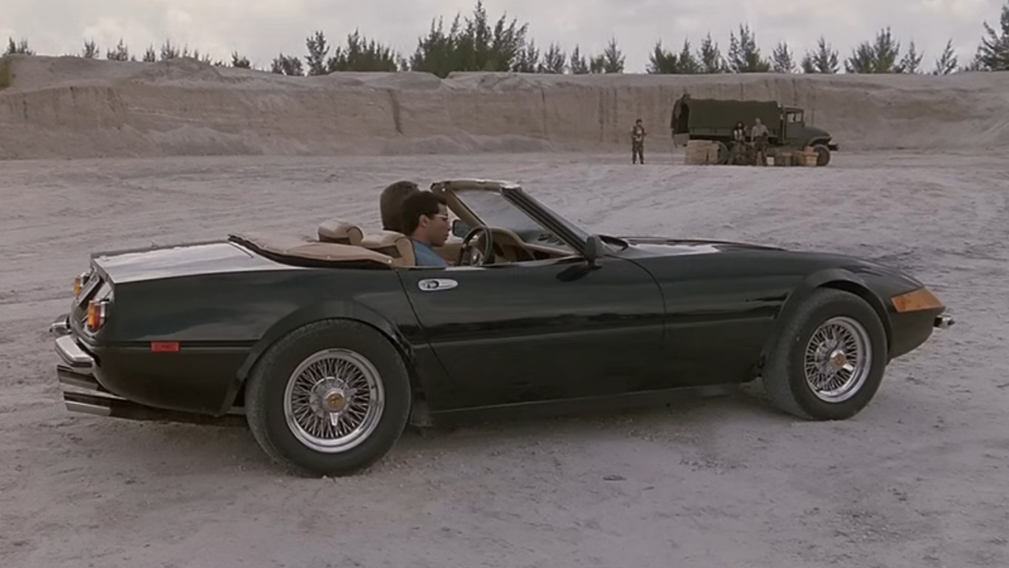 Crockett and Tubbs driving the in black Ferrari in Miami Vice
