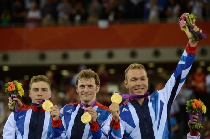 Great Britain's team sprint members celebrate gold at the London Olympics
