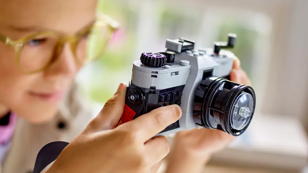 Lego Retro Camera in the hands of young child