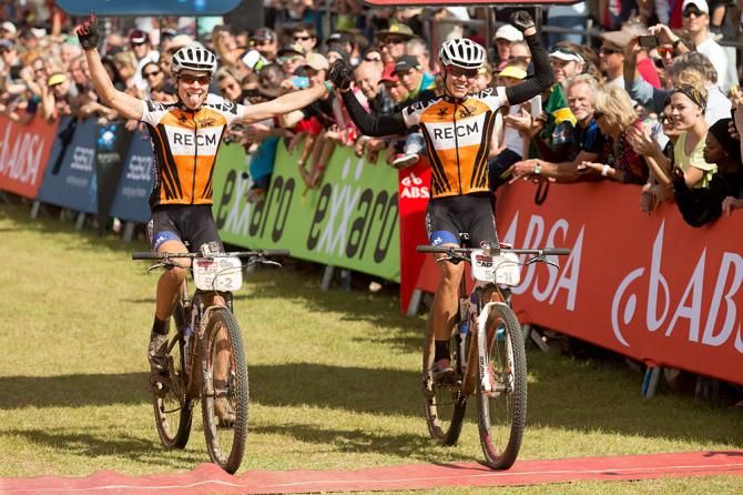Annika Langvad (left) and Ariane Kleinhans of Team RECM2 win the ladies Cape Epic