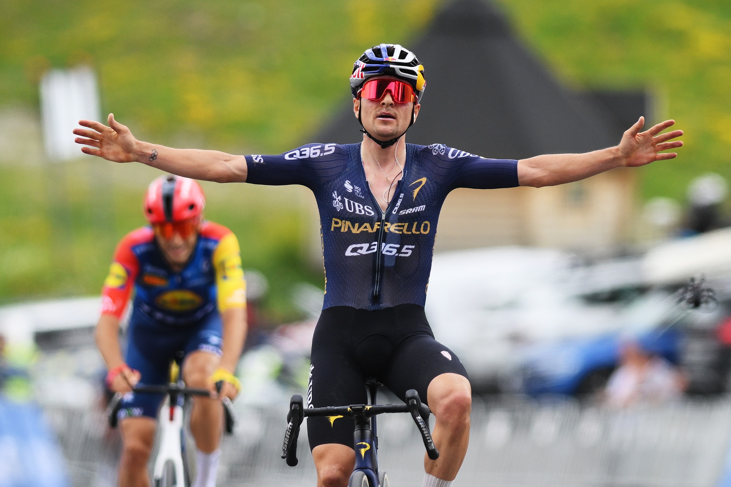 Tom Pidcock of Great Britain and Team Pinarello Q36.5 Pro Cycling celebrates at finish line as race winner during the 2nd Andorra MoraBanc Classica 2026 a 125km one day race from Andorra la Vella to Coll de la Botella 2072m on June 21, 2026 in Coll de la Botella, Andorra. (Photo by Alex Broadway/Getty Images)