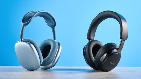the bose quietcomfort ultra gen 2 headphones in black photographed on a blue tom's guide background