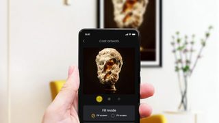Tokenframe; a photo of the Tokenframe app on a phone