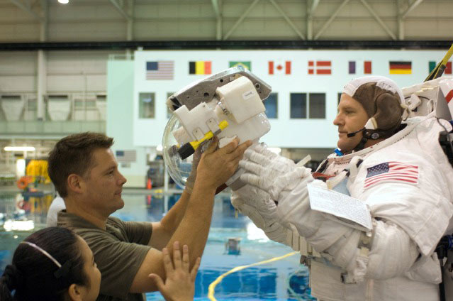 Mission Discovery: Spacewalkers Poised for Orbital Work