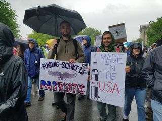 Mechanical engineer Adam Yeager (left) of Lancaster, Pennsylvaniaand childhood friend Brad Ochock, an ecologist in Houston, live in different states but met up in Washington D.C. to show their support for the March for Science on April 22, 2017.