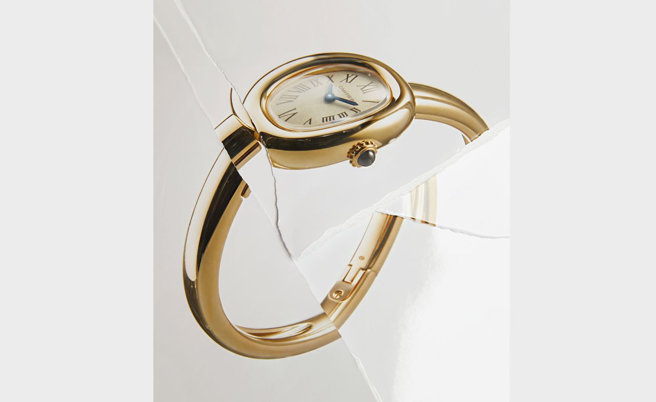 Cartier Baignoire watch with gold bangle