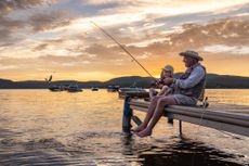 Man with his grandson fishing