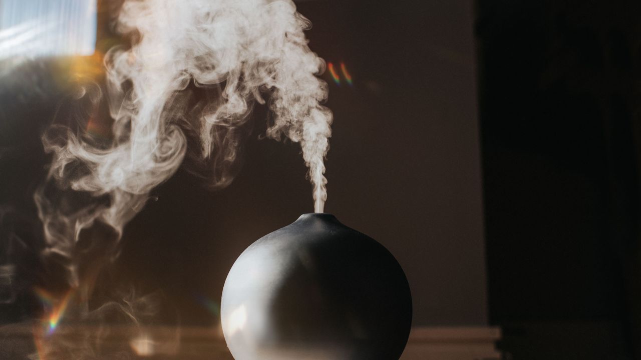 an essential oil diffuser works