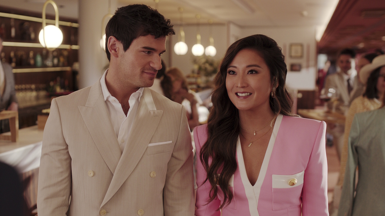 Paul Forman and Ashley Park are shown on Emily in Paris.