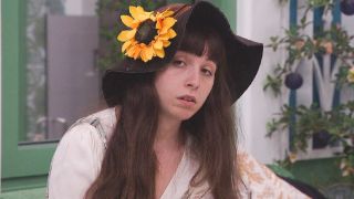 Ava wearing her sunflower