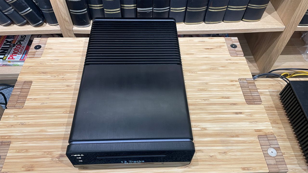 A top-down view of a black Cyrus 40 CD CD player.