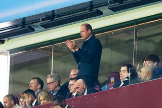 Prince William, Prince of Wales applauds the team during the UEFA Europa Conference League 2023/24 Quarter-final first leg match between Aston Villa and Lille OSC at Villa Park on April 11, 2024 in Birmingham, England.