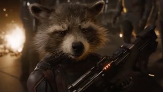 Rocket Raccoon holding laser gun in Guardians of the Galaxy Vol. 3