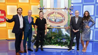 James O’Halloran, George Gray, Jeff Probst, Drew Carey and Alexis Gaube standing in front of a Survivor sign in The Price Is Right at Night