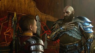 God of War Ragnarok's Kratos places his hand on his chest as he speaks to Atreus