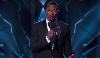 Nick Cannon hosting the Masked Singer.